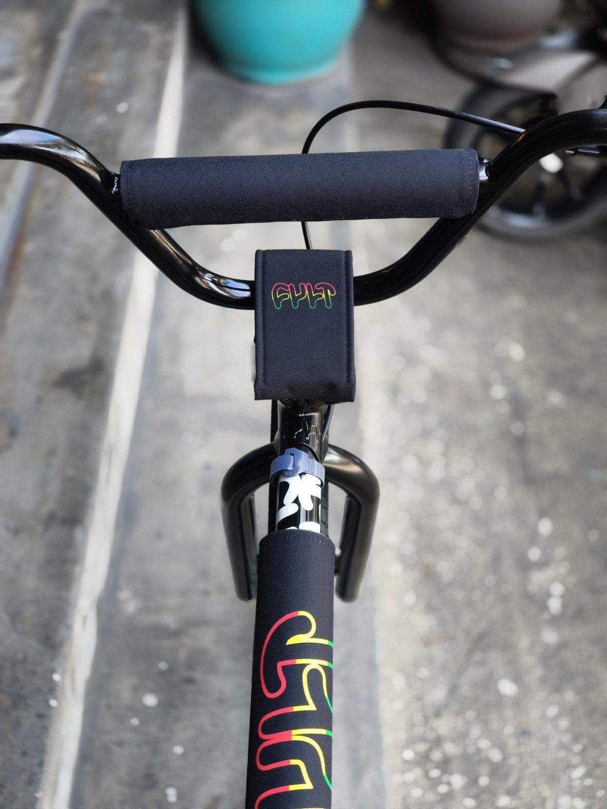 CULT DEVOTION 26" CRUISER- Black / Rasta Colorway