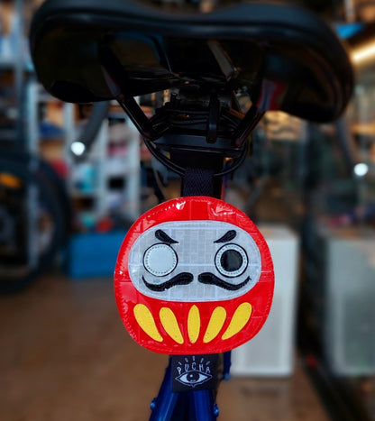 Pucha, Reflectors - Daruma Dolls (available in various designs)